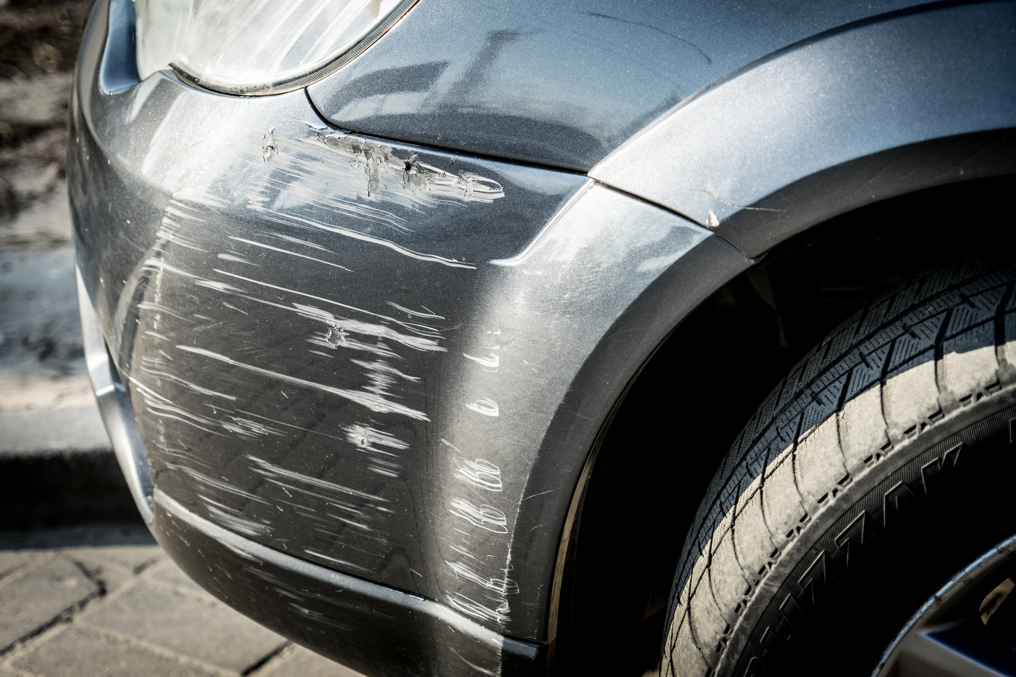 scratched car bumper
